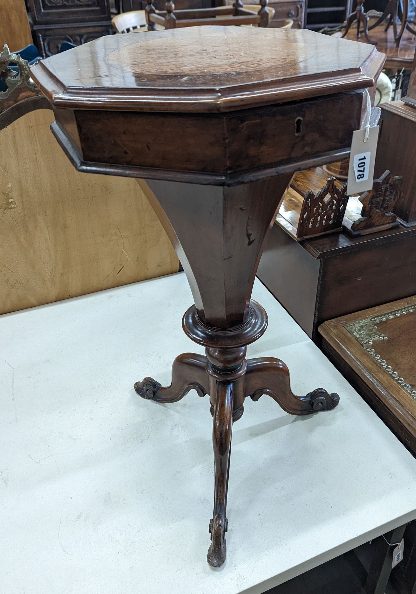 A Victorian marquetry inlaid walnut octagonal trumpet work box, width 41cm, height 74cm